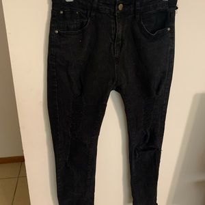 Black jeans with rips